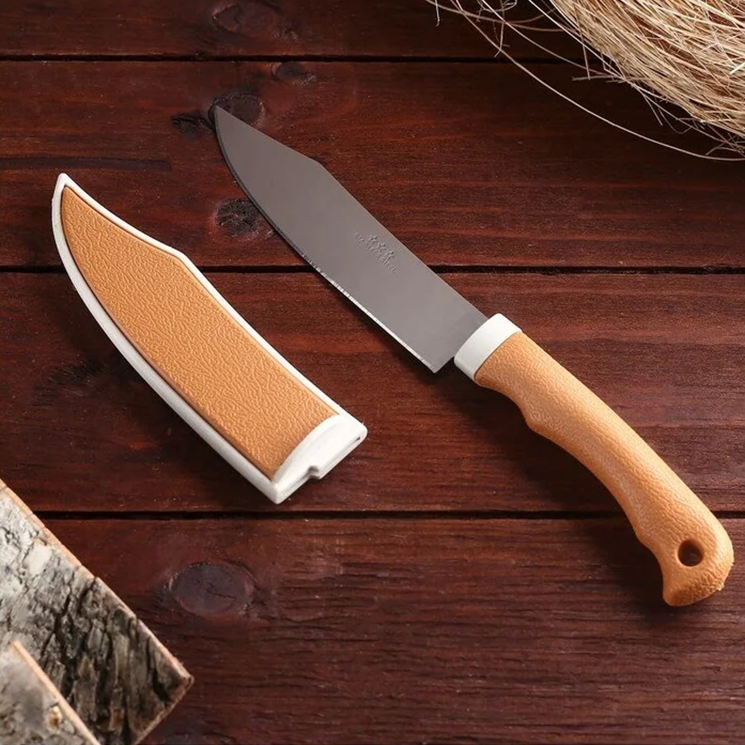 Kitchen knife with cover and sharp blade.