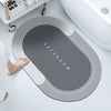 Super absorbent bath mat with slip-resistant design