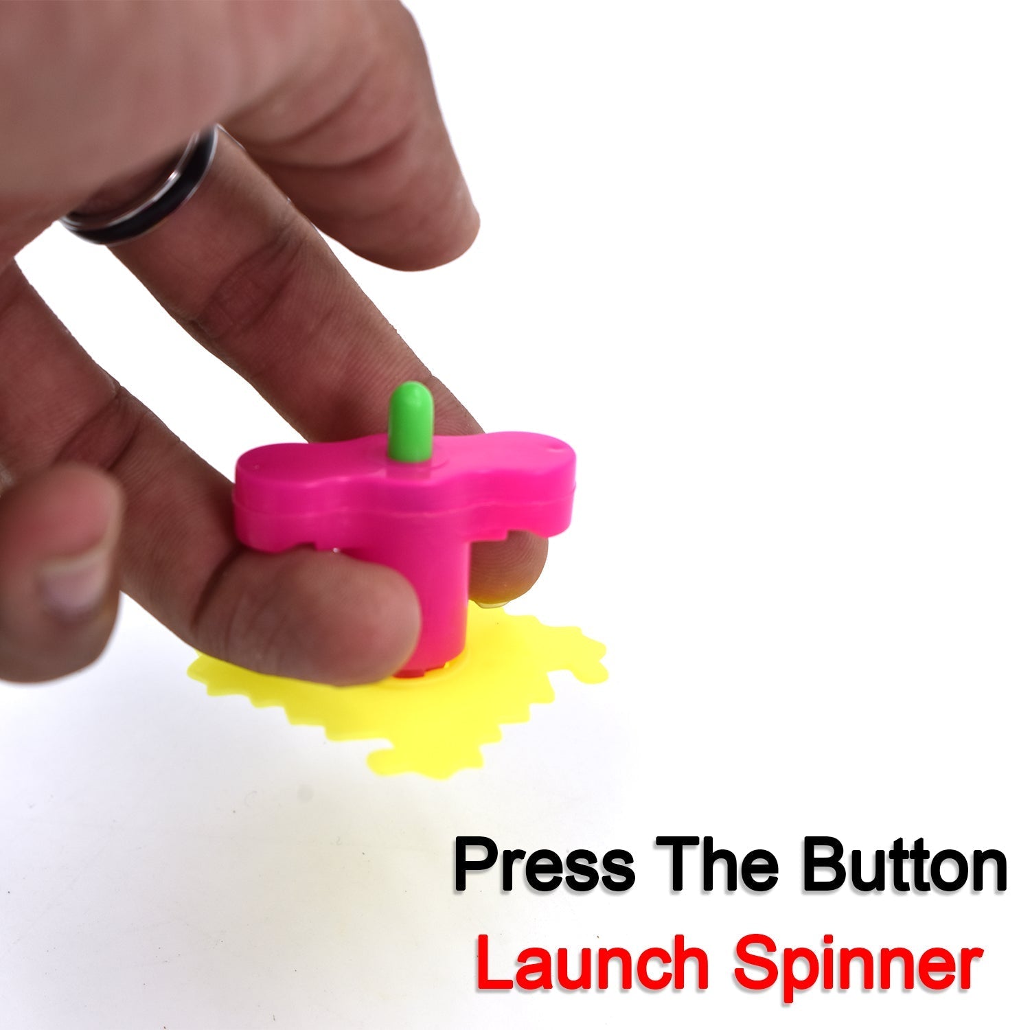 Toy spinner with launch mechanism