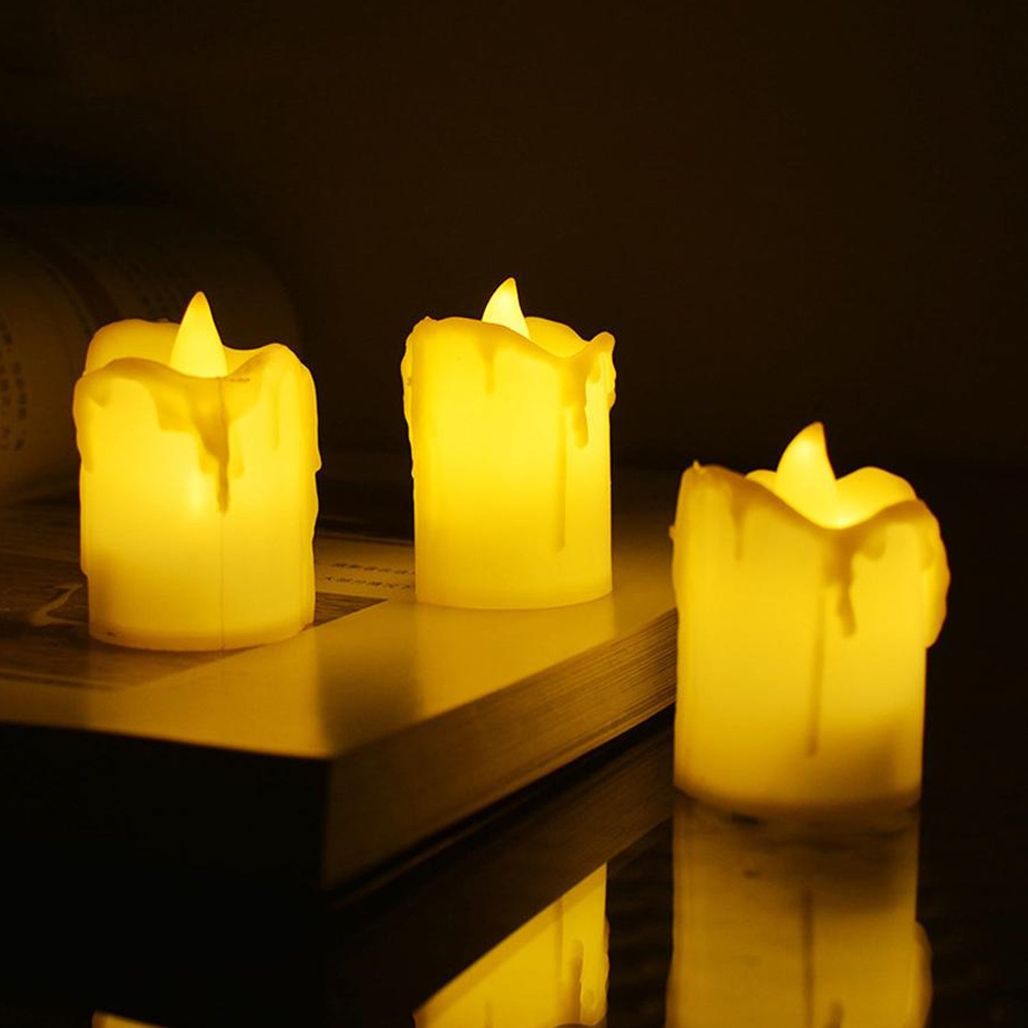 24pc flameless candles with melted design.