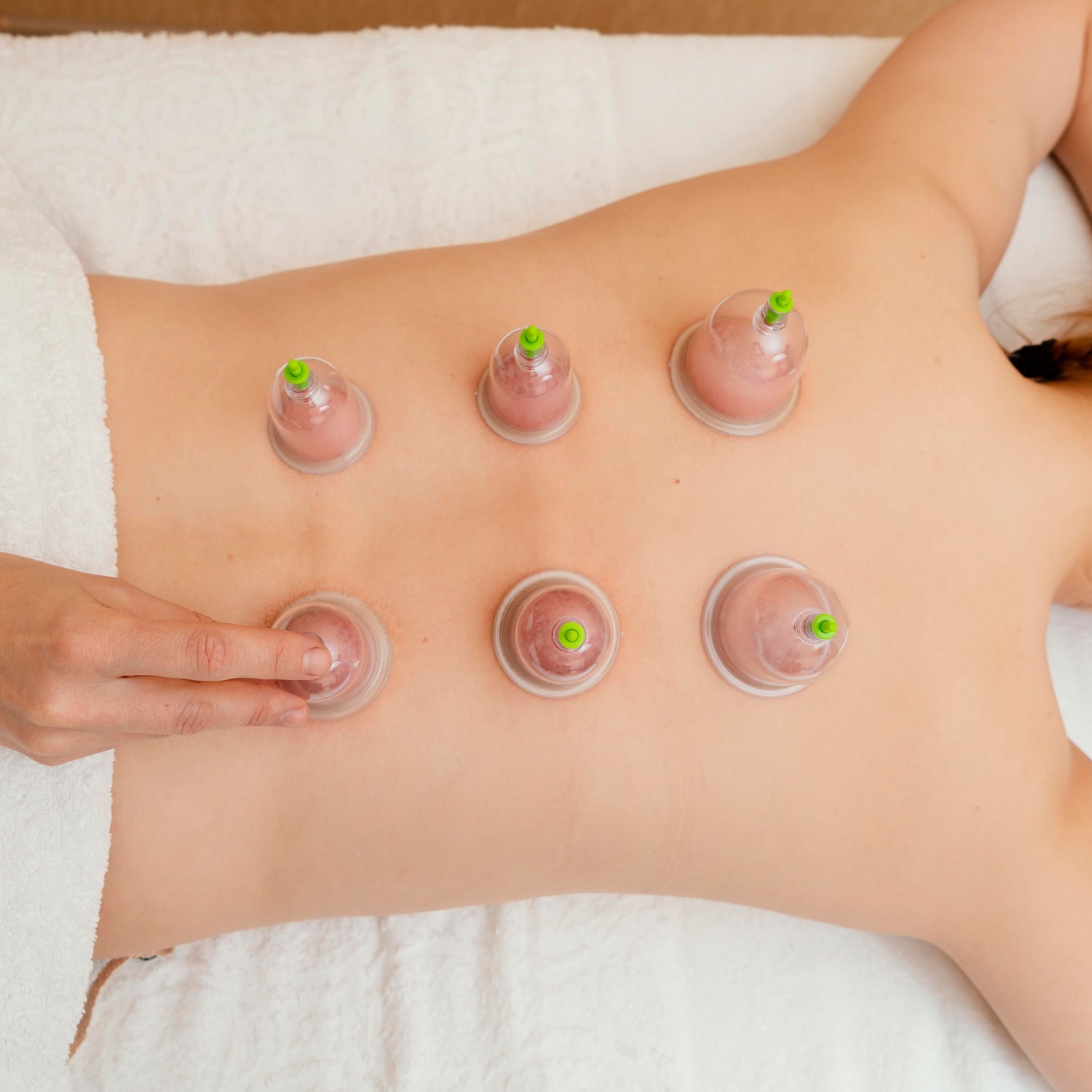 Cupping therapy kit with six suction cups for muscle relief and relaxation.