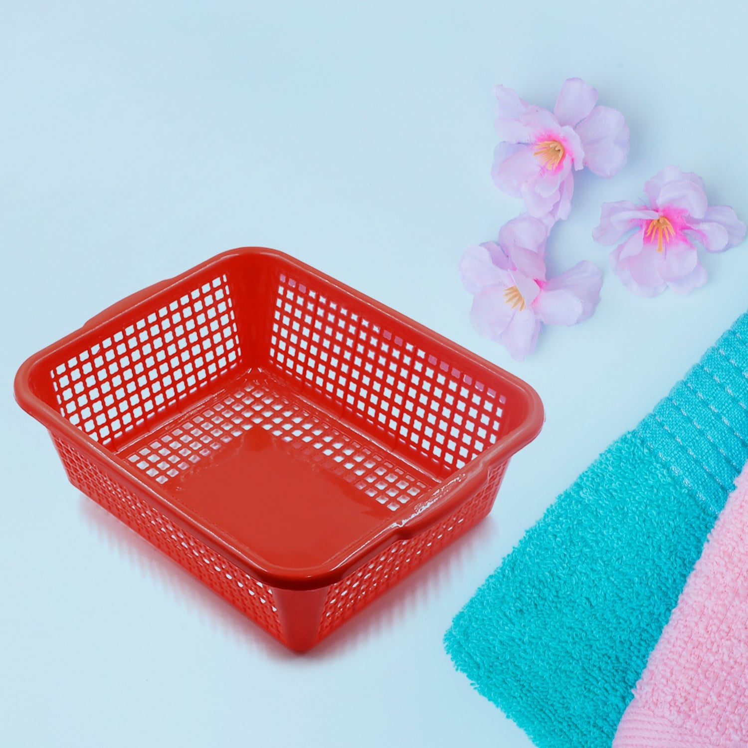 Rectangular drain basket for kitchen use, suitable for fruit and vegetable washing.