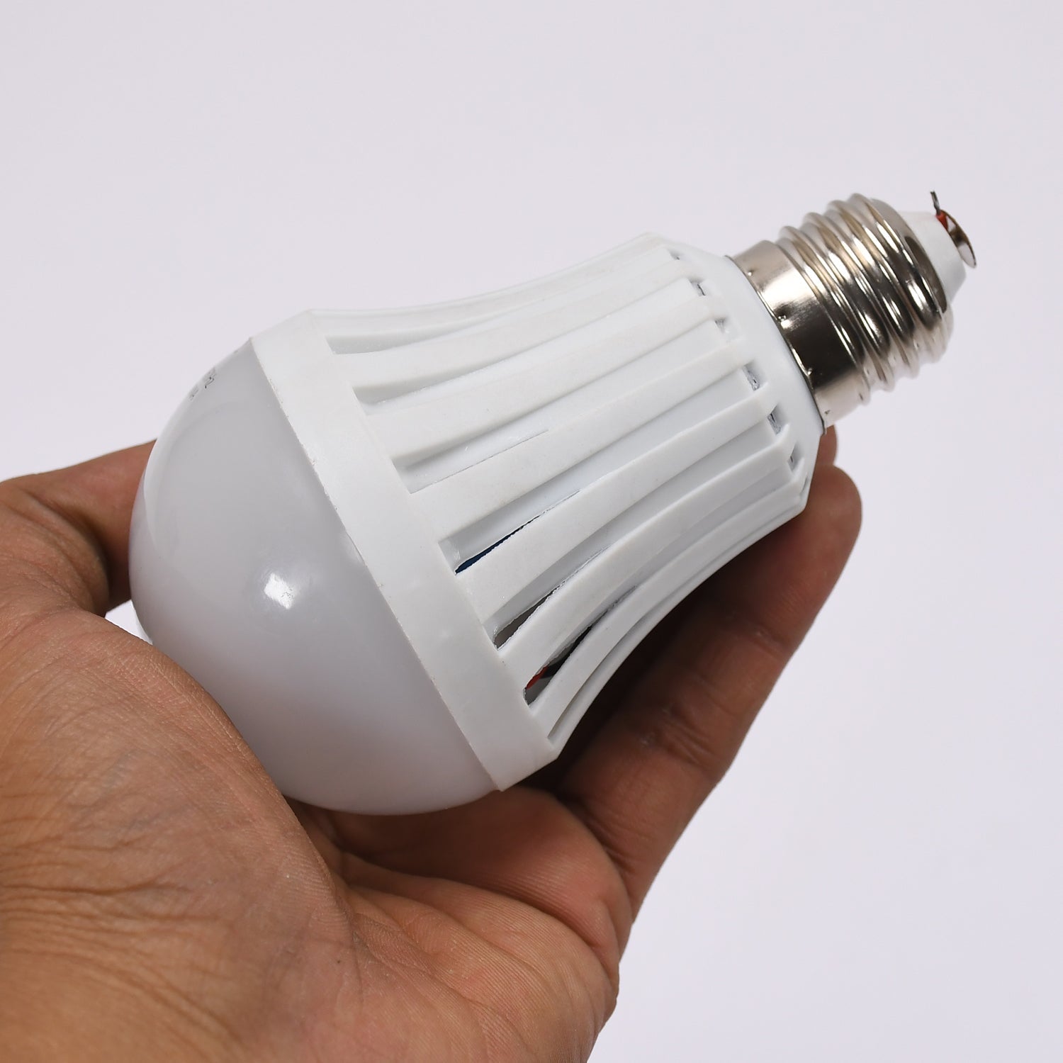 LED bulb with a green label.