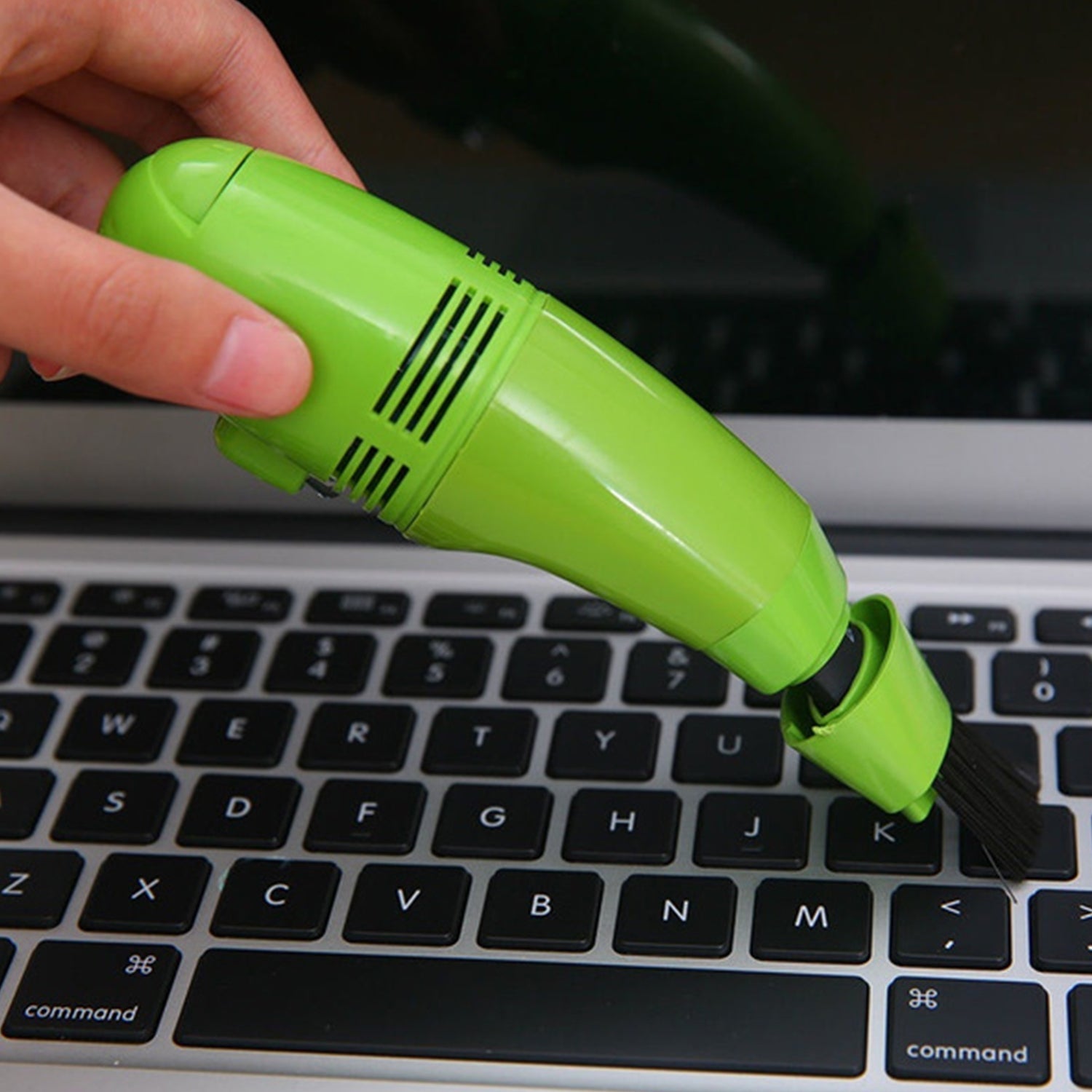 Lightweight USB mini vacuum for precise cleaning of small areas and gadgets.