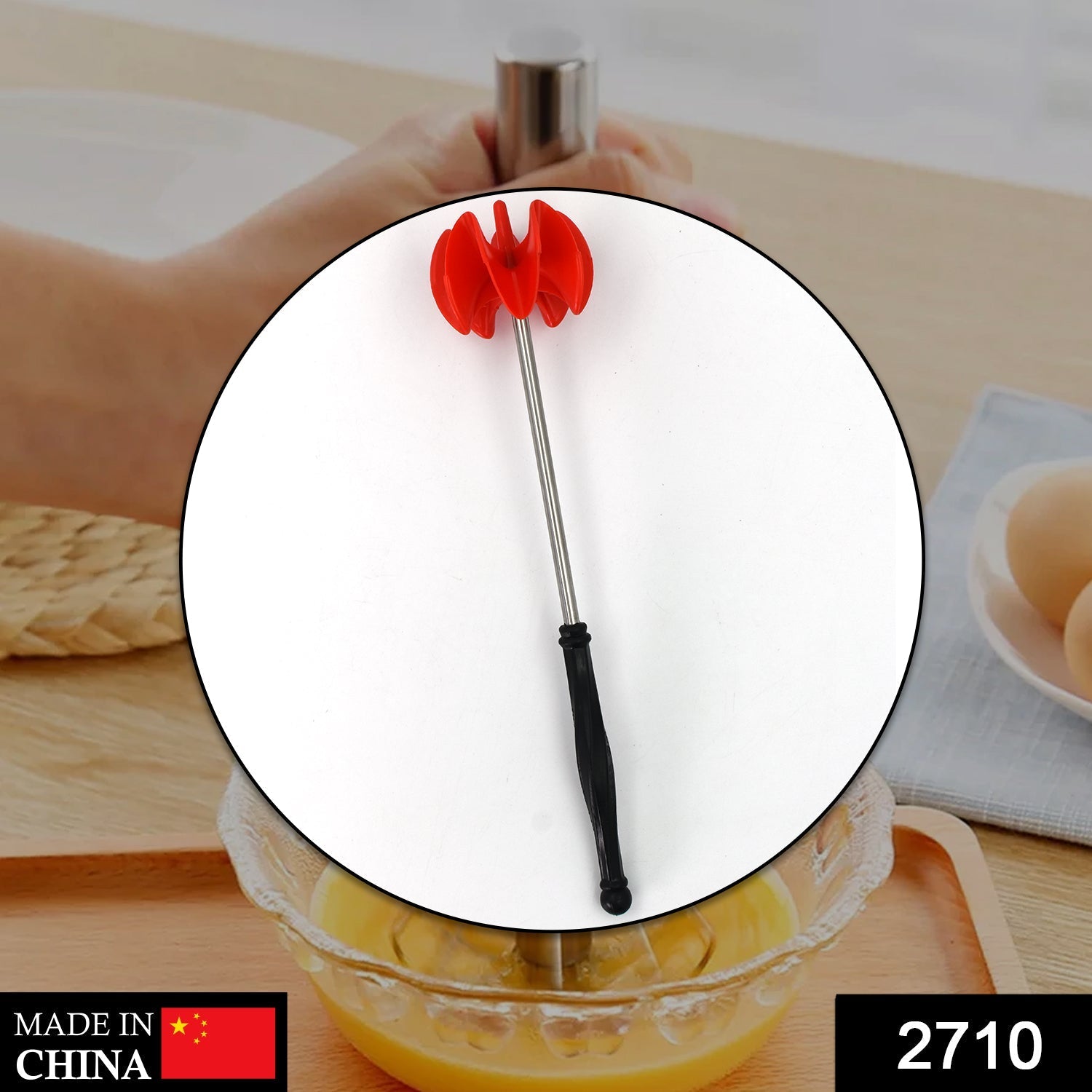 Handheld manual mixer for kitchen mixing tasks.