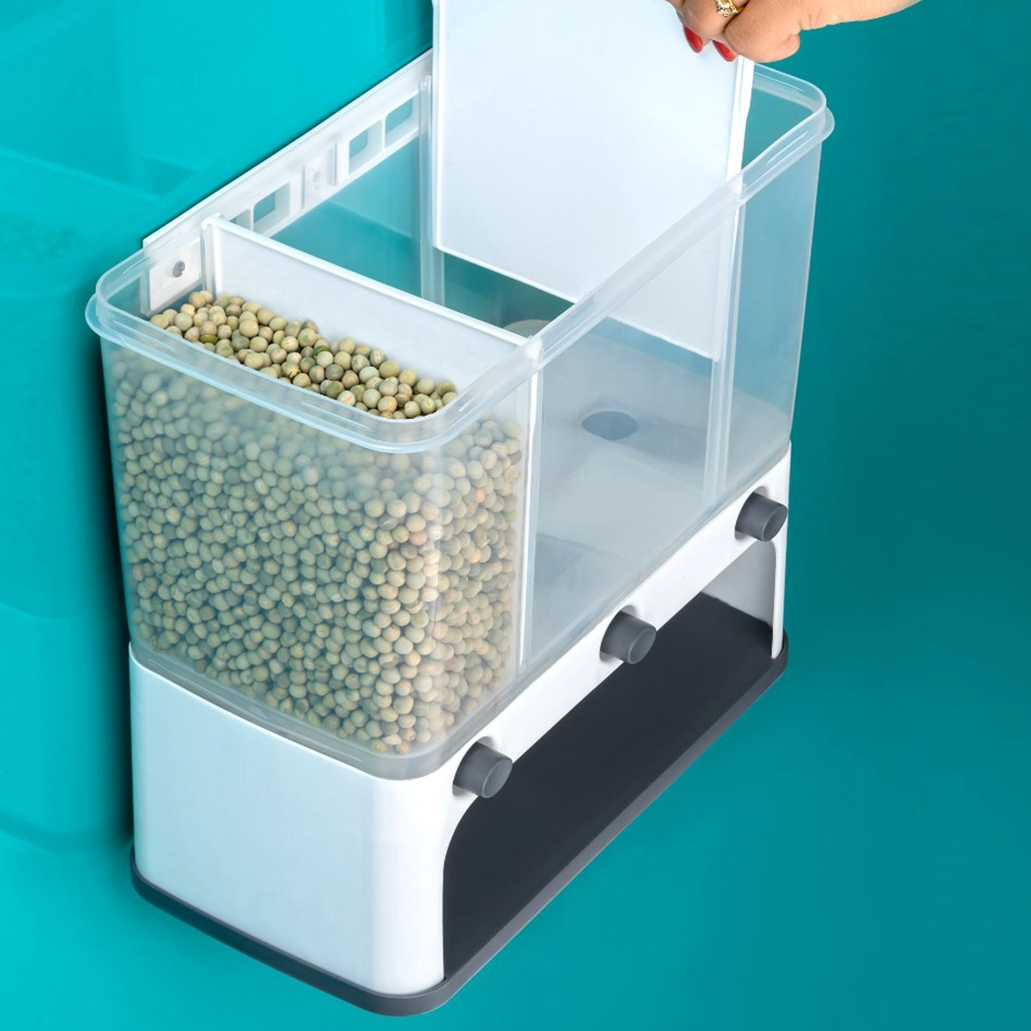 Wall-mounted cereal dispenser in use