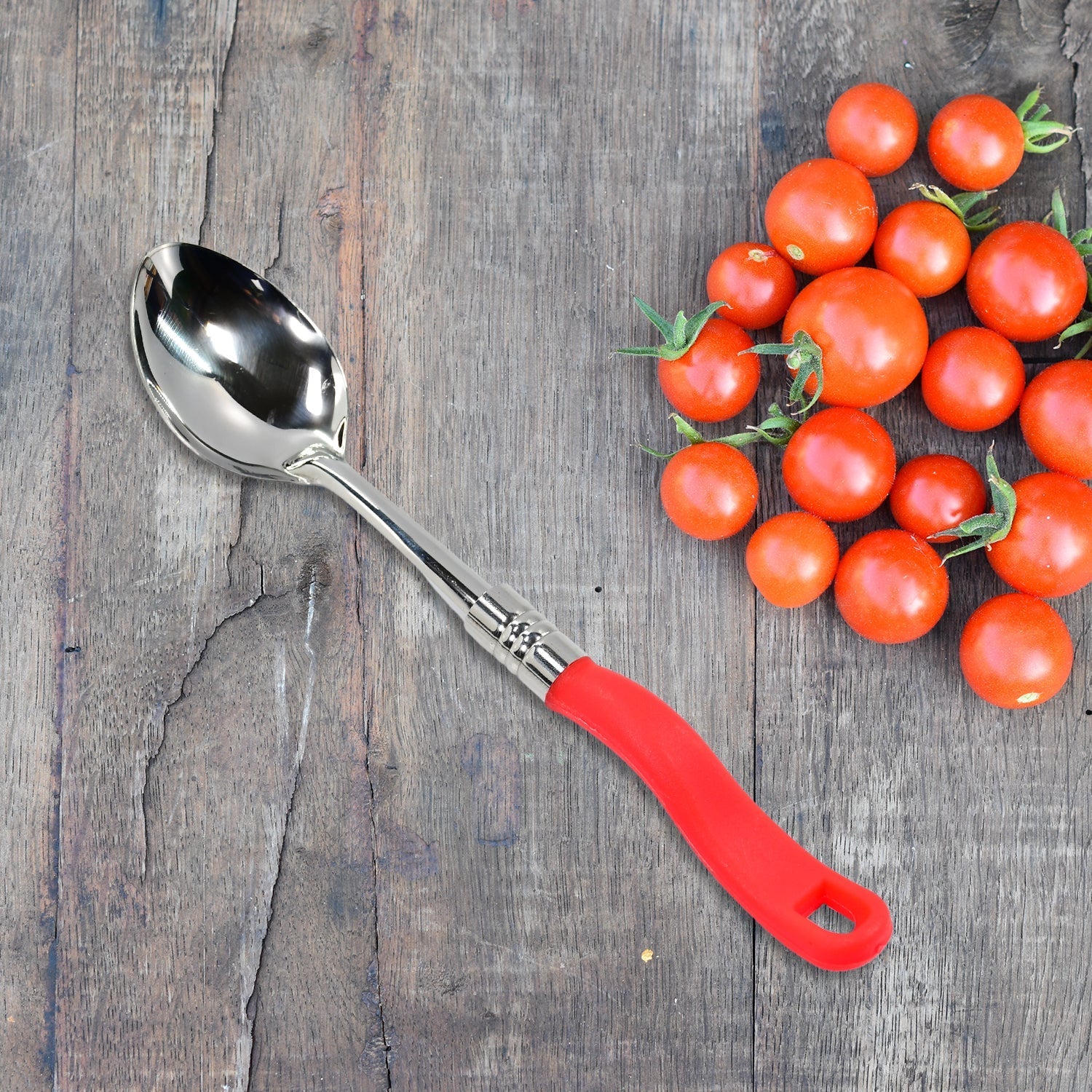 Serving spoon with stainless steel head and plastic handle