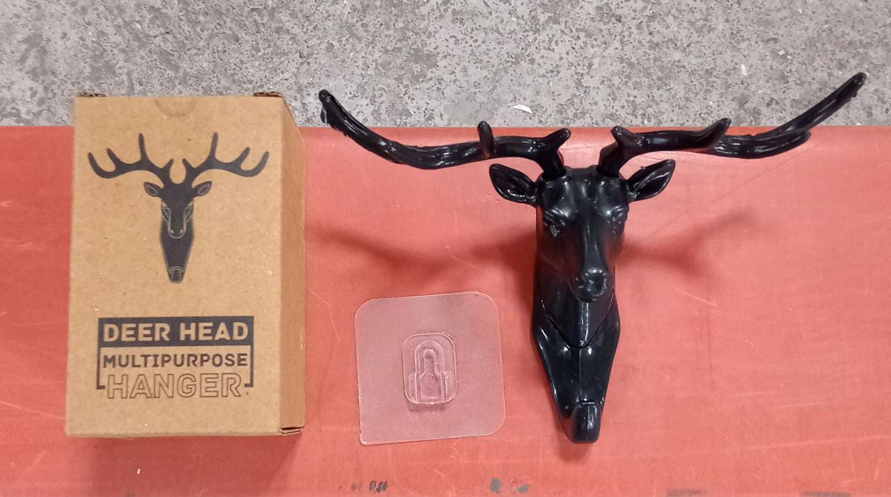 Deer head hook with self-adhesive backing for convenient hanging