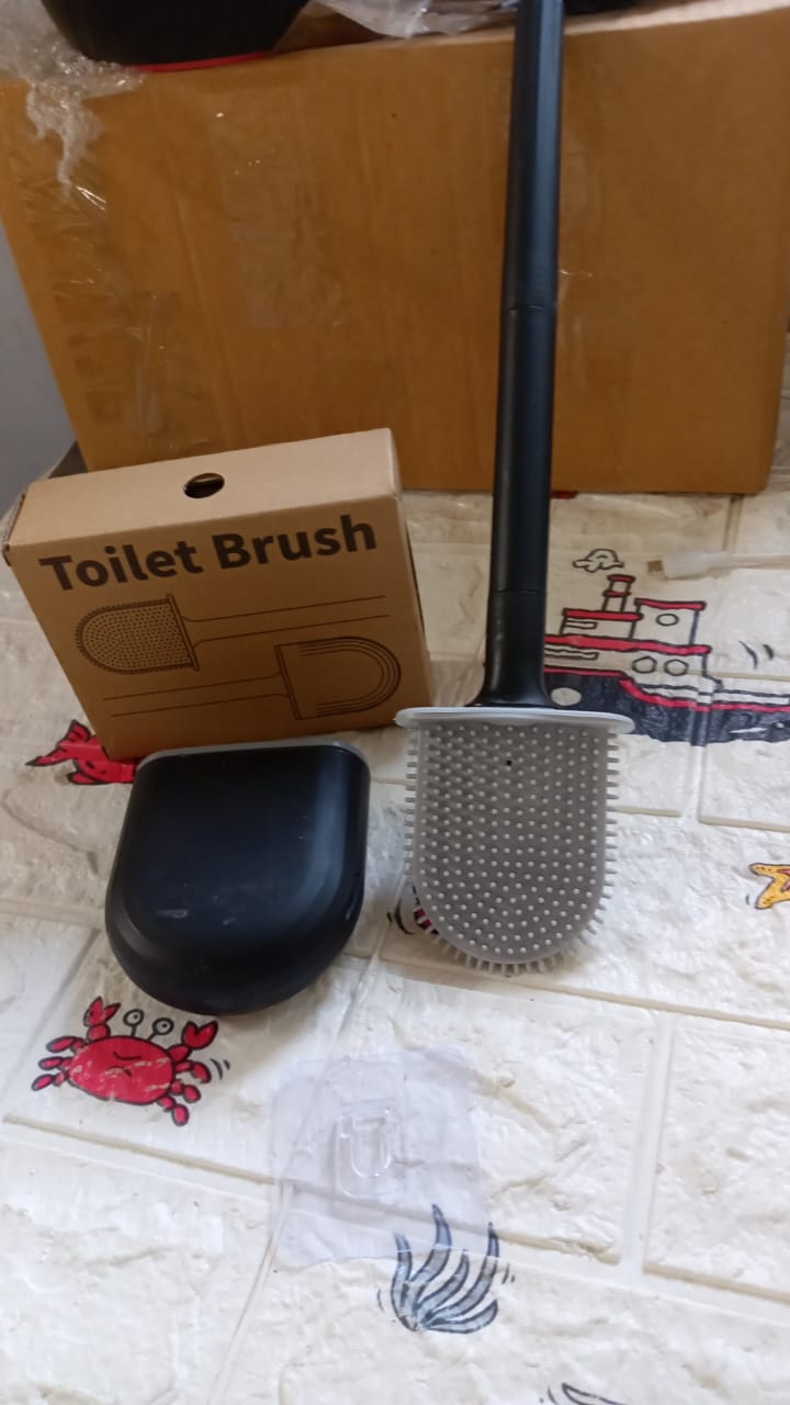 Toilet brush with ergonomic handle