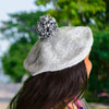 Warm winter beret cap in stylish design, suitable for men and women.