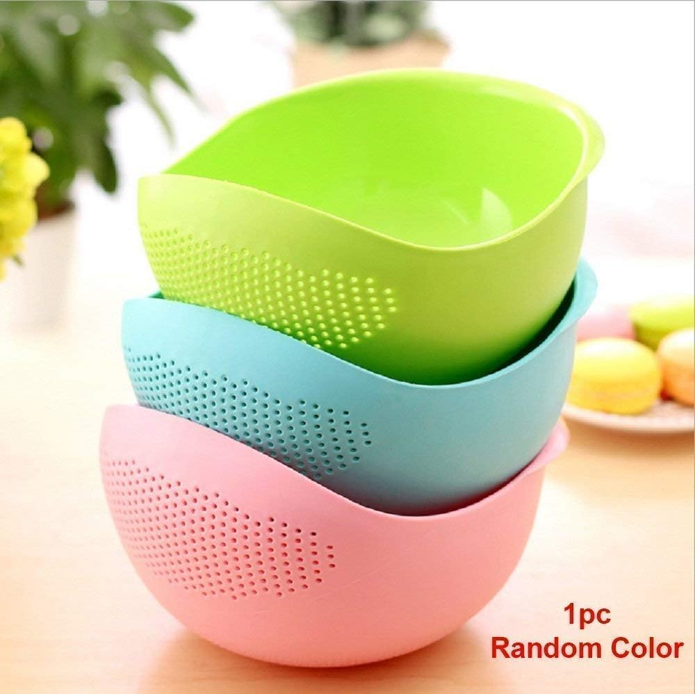 Durable plastic water strainer bowl for rinsing vegetables and fruits.