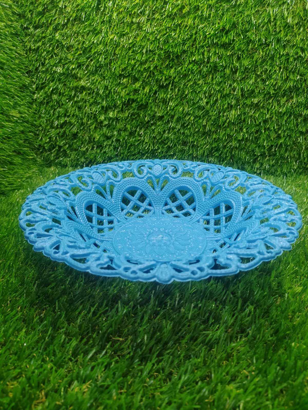 Round basket with flower pattern, ideal for storage