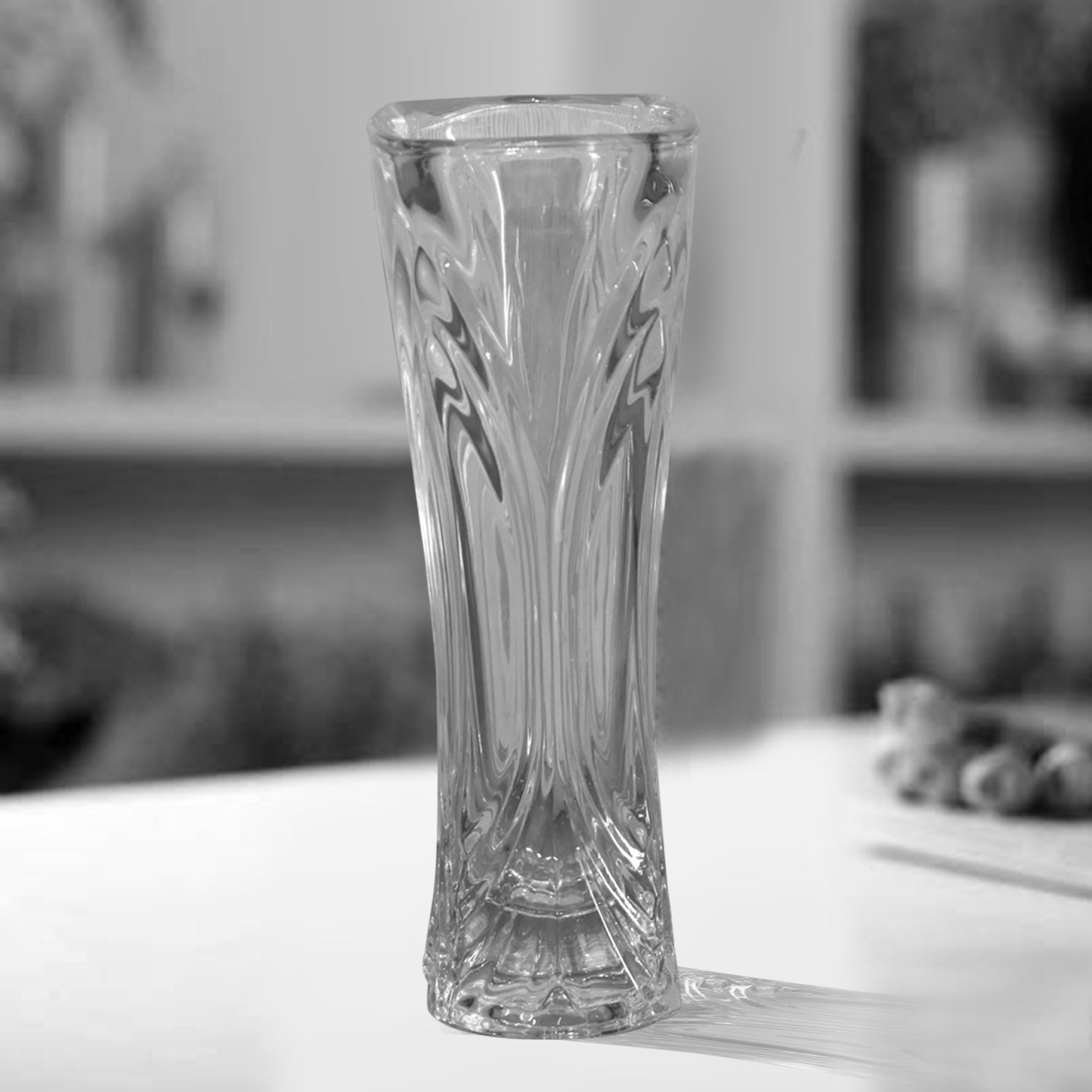 Modern crystal clear vase for elegant flower arrangements.